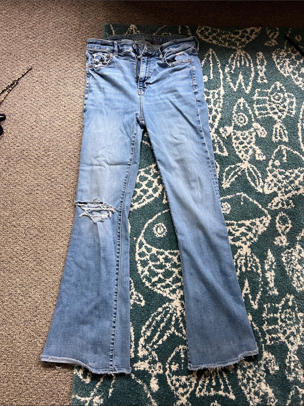 Light Blue Women's Flare Jeans - Casual Distressed Style. American eagle